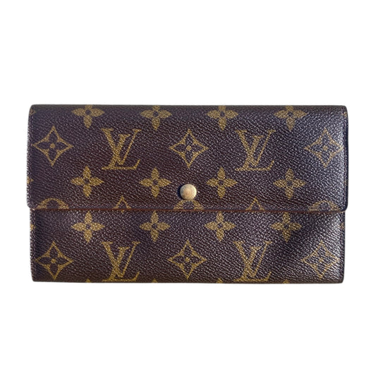 Louis Vuitton Sarah wallet monogram 100% authentic.